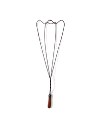 antique rug beater