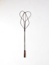 antique rug beater