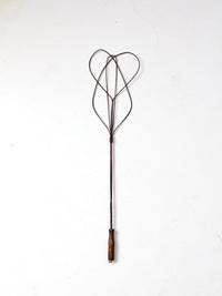 antique rug beater