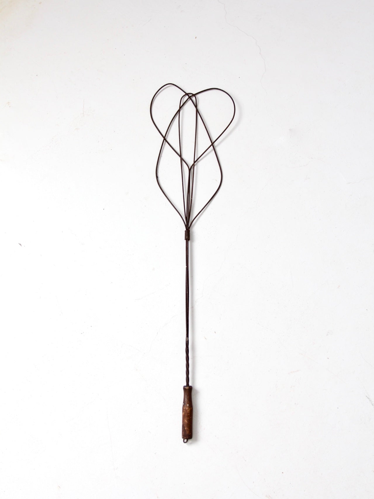 antique rug beater