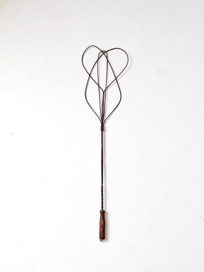 antique rug beater