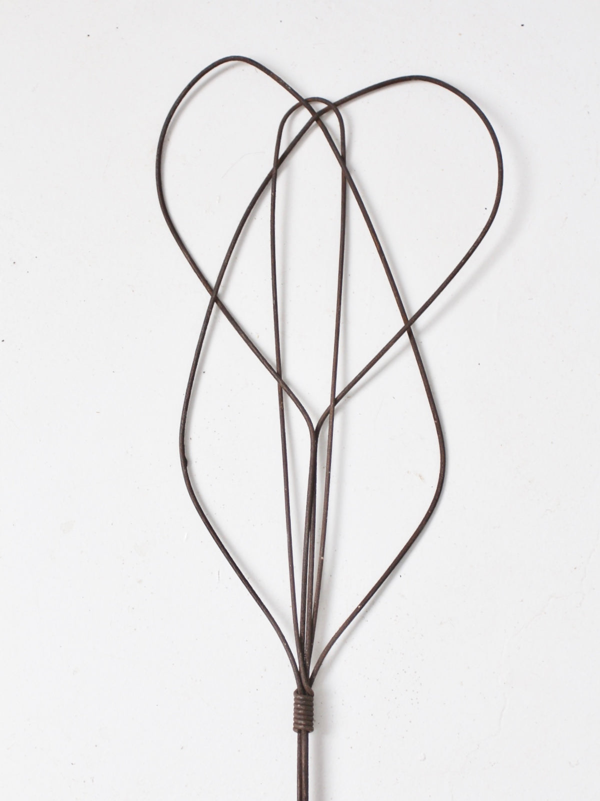 antique rug beater