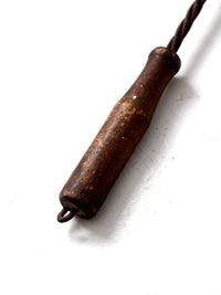 antique rug beater
