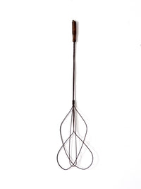 antique rug beater
