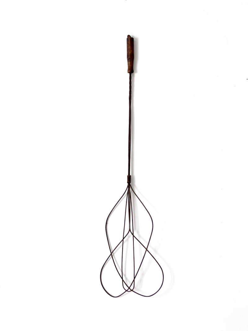 antique rug beater