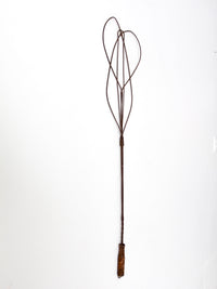 antique rug beater