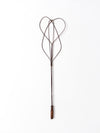 antique rug beater
