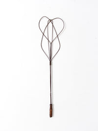 antique rug beater