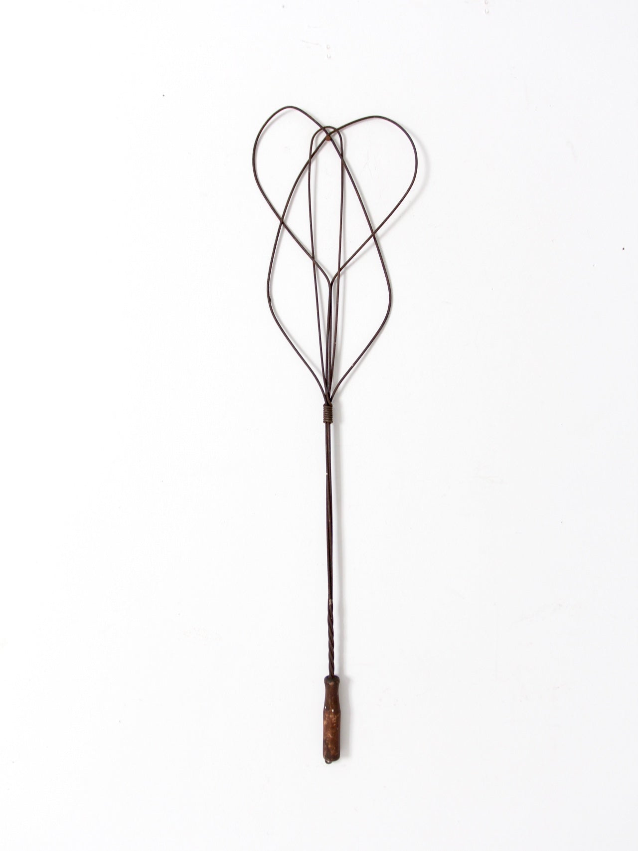 antique rug beater