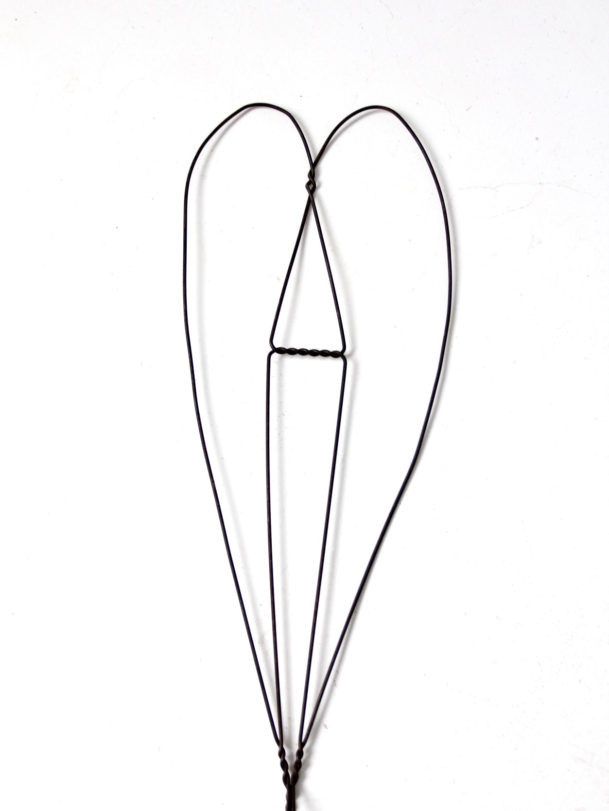 antique rug beater