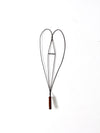 antique rug beater