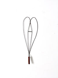 antique rug beater