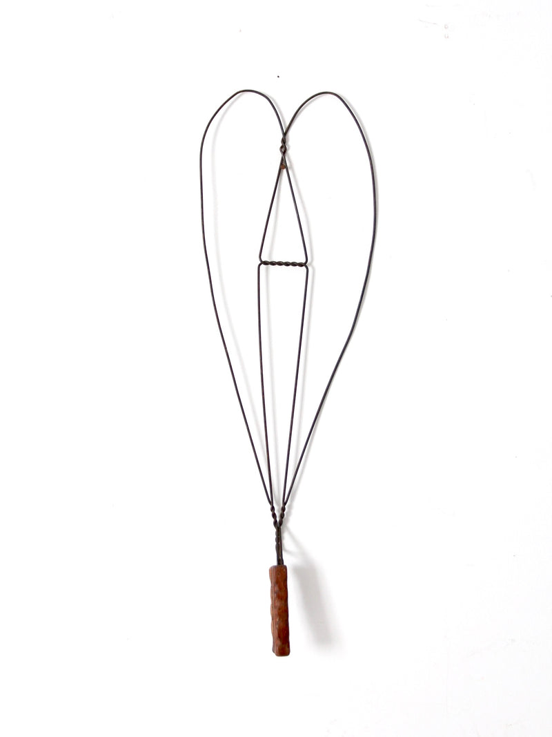 antique rug beater