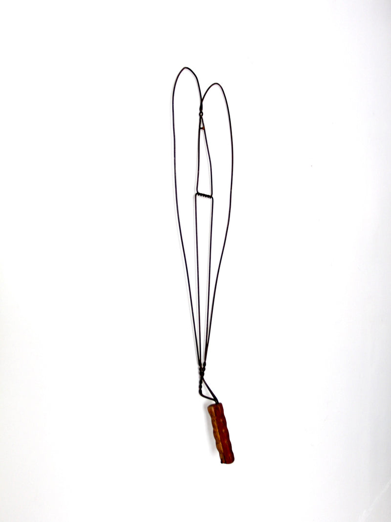 antique rug beater