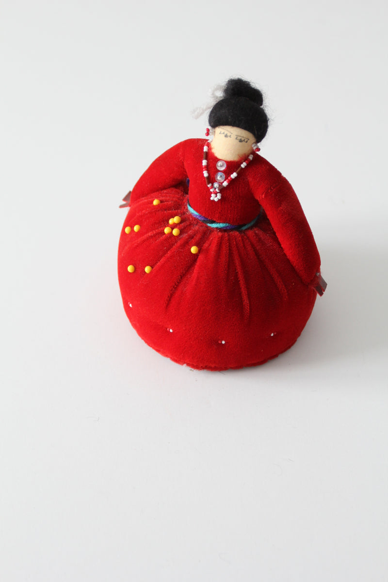 red pin cushion